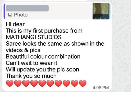 WhatsApp message with a photo of a black and gold saree: first purchase, looks the same as the videos, beautiful colour combination